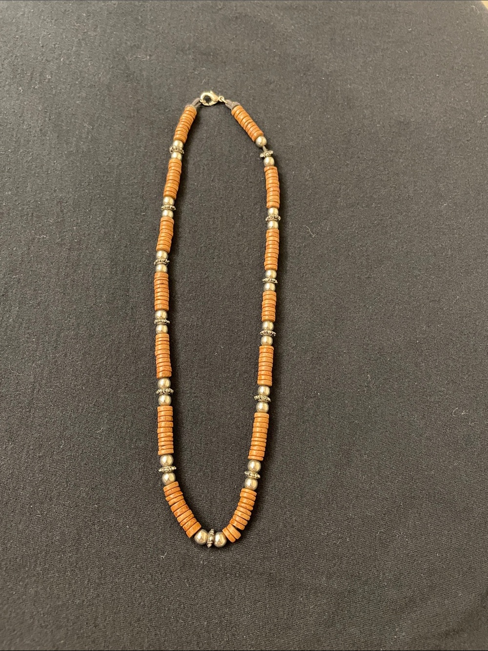 Handcrafted Brown Beaded Necklace with Silver Accents